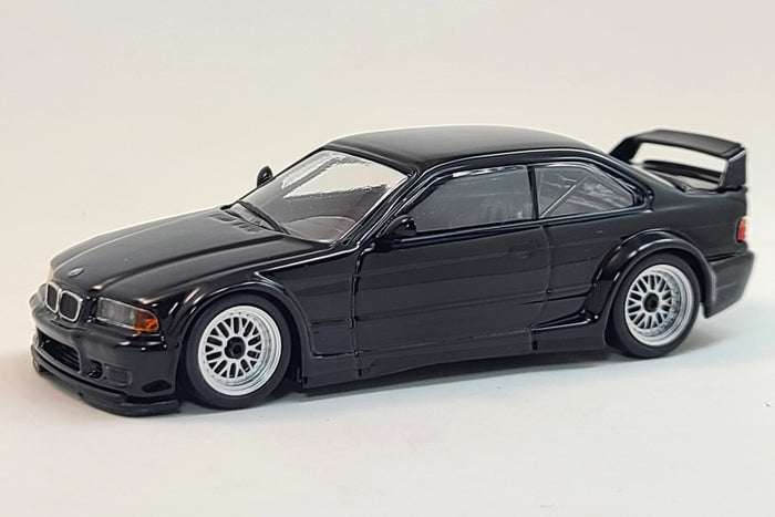 BMW M3 GTR (E36) | 1:43 Scale Diecast Model Car by Maxichamps | Black | Front Quarter