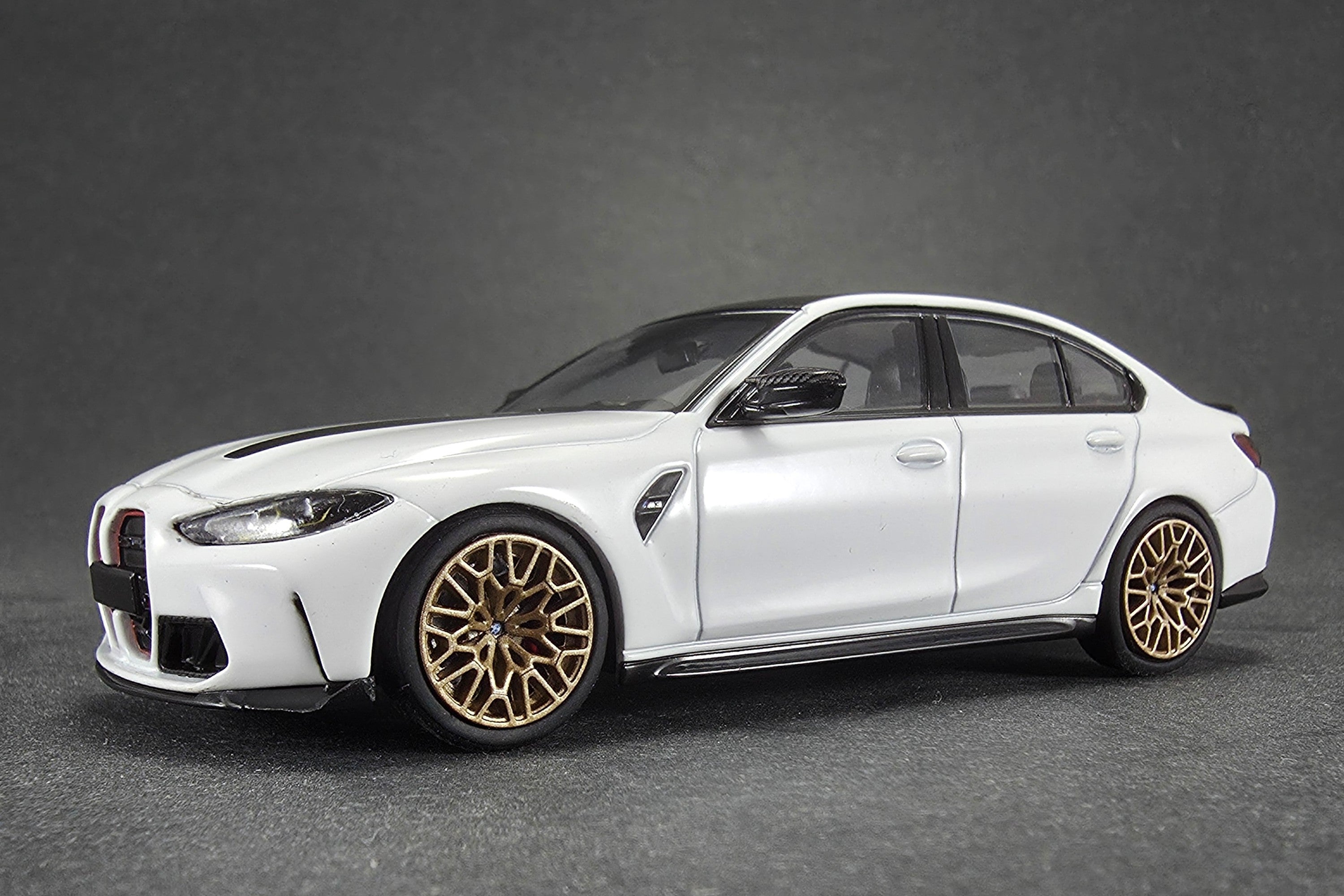 1:43 scale diecast BMW M3 CS (G80) by Minichamps | Front Left Quarter