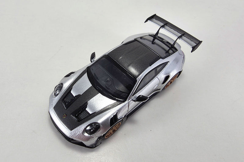 1:64 scale diecast Porsche 911 GT3 RS (992) by Minichamps | Overhead View