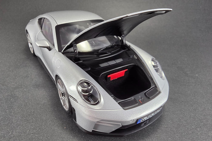 1:18 scale diecast Porsche 911 GT3 Touring (992) by Norev | Frunk Detail