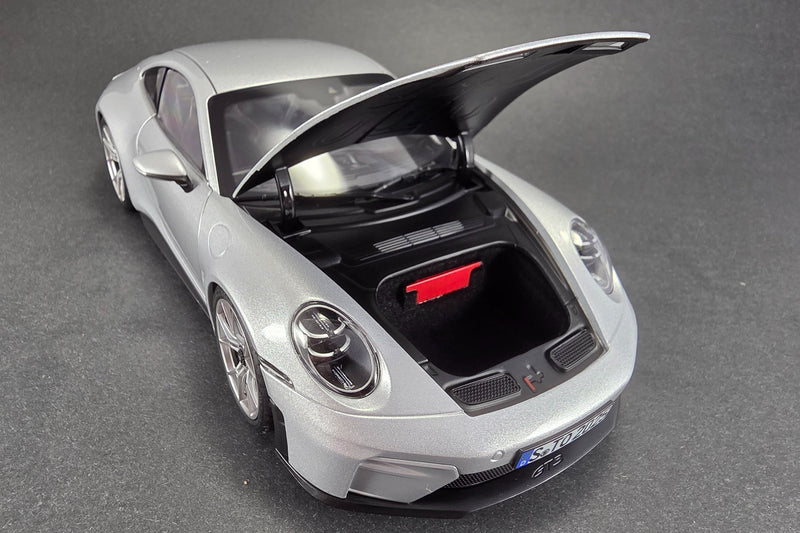1:18 scale diecast Porsche 911 GT3 Touring (992) by Norev | Frunk Detail