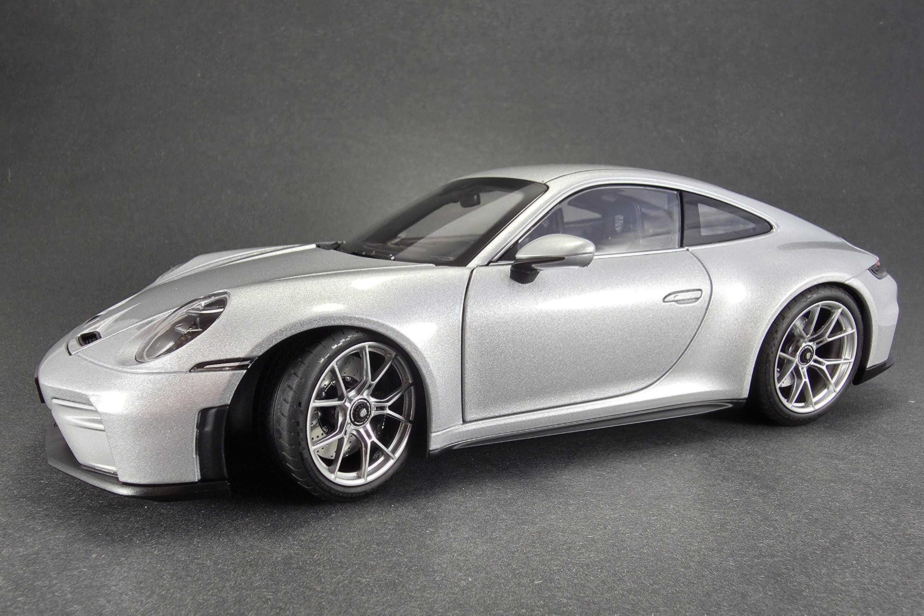 1:18 scale diecast Porsche 911 GT3 Touring (992) by Norev | Left Front Quarter
