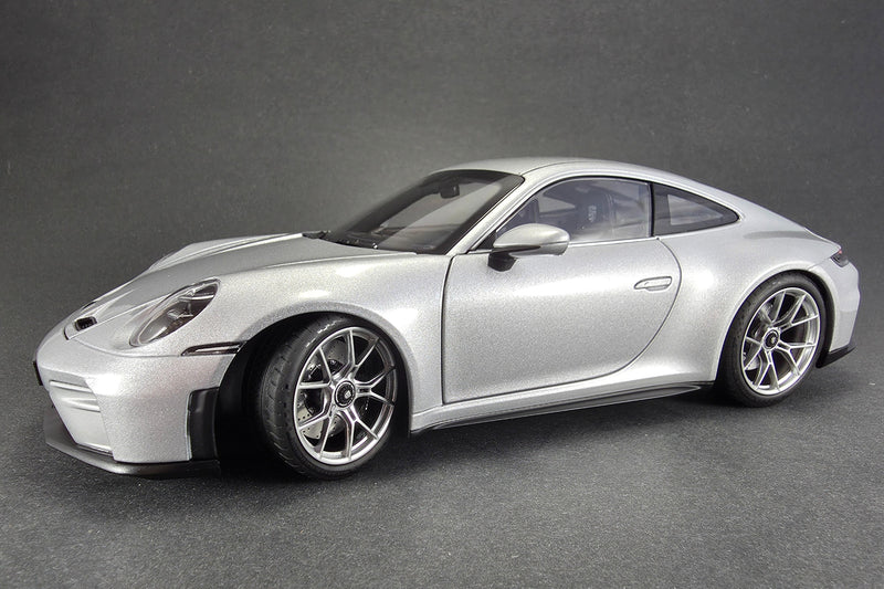 1:18 scale diecast Porsche 911 GT3 Touring (992) by Norev | Left Front Quarter
