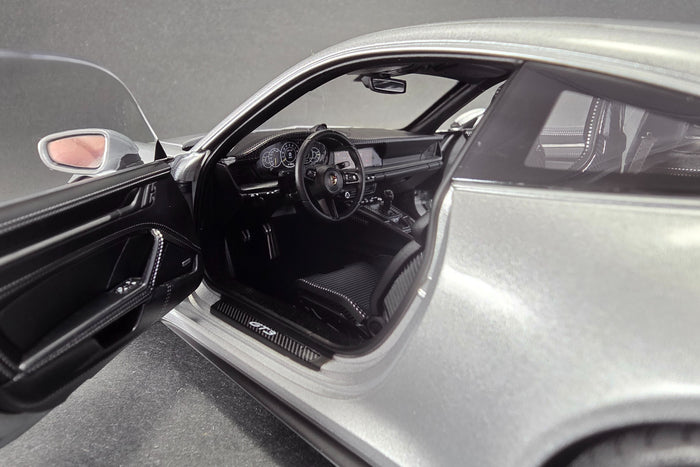 1:18 scale diecast Porsche 911 GT3 Touring (992) by Norev | Left Interior Detail
