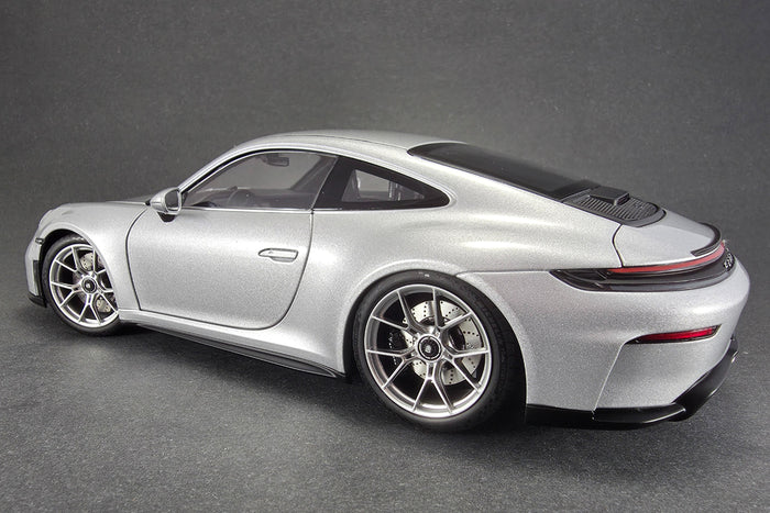 1:18 scale diecast Porsche 911 GT3 Touring (992) by Norev | Left Rear Quarter