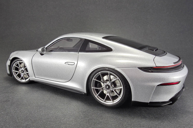 1:18 scale diecast Porsche 911 GT3 Touring (992) by Norev | Left Rear Quarter