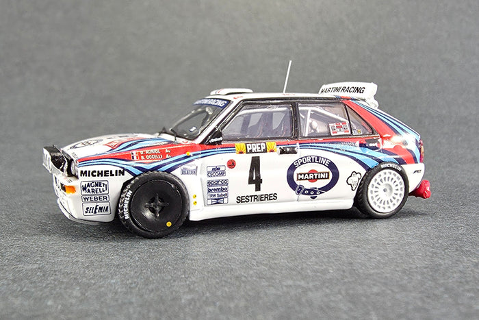 1:64 Scale Lancia Delta HF Integrale (1992 Monte Carlo Rally Winner) by Tarmac Works | Front Quarter