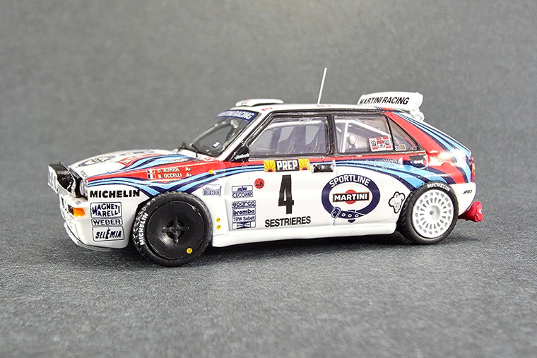 Lancia Delta HF Integrale (1992 Monte Carlo Rally Winner) - 1:64 Scale Diecast Model Car by Tarmac Works