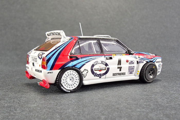 1:64 Scale Lancia Delta HF Integrale (1992 Monte Carlo Rally Winner) by Tarmac Works | Rear Quarter