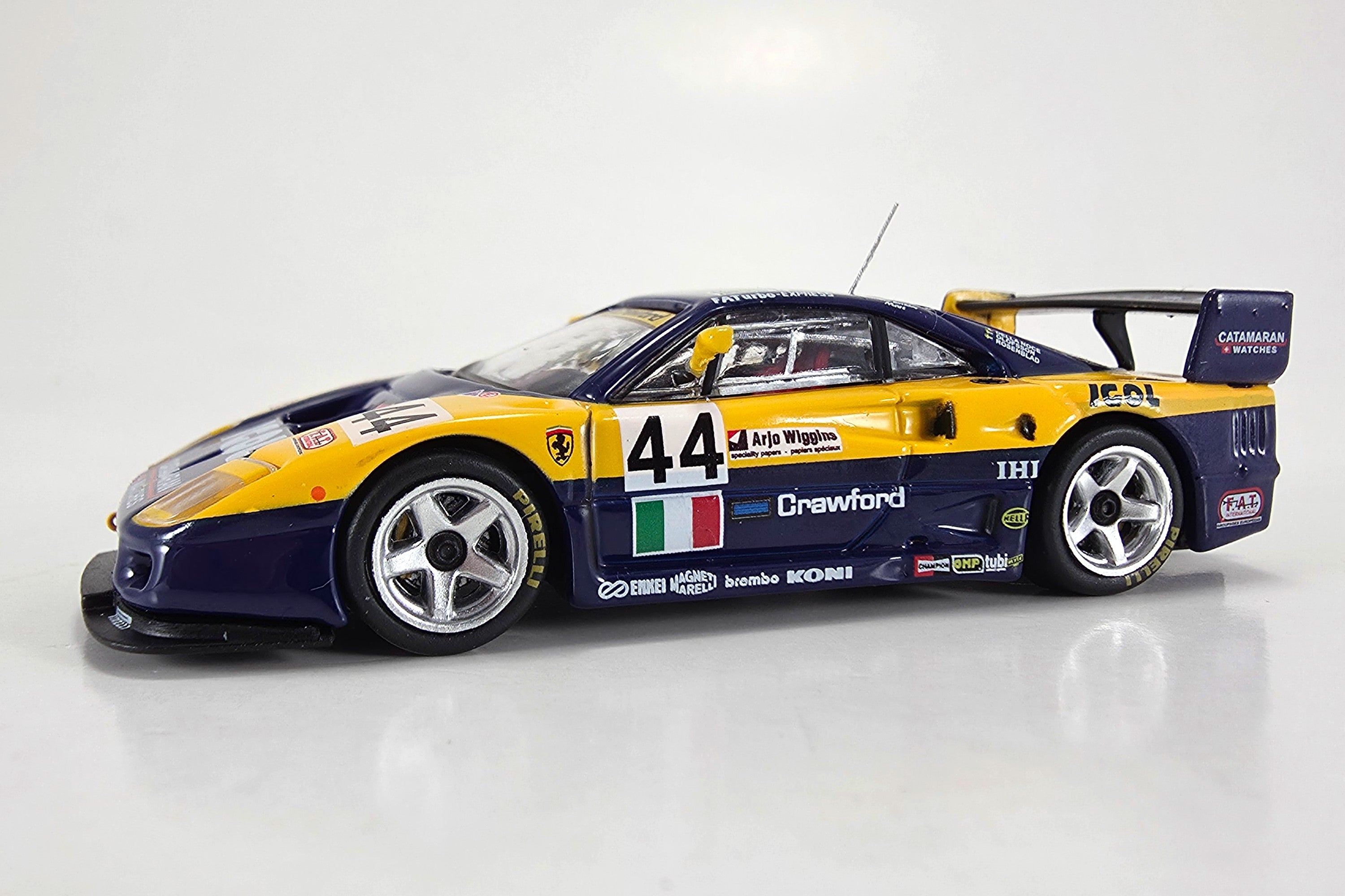 1:64 scale diecast Ferrari F40 GTE (1996 24 Hours of Le Mans #44) by Tarmac Works | Left Front Quarter
