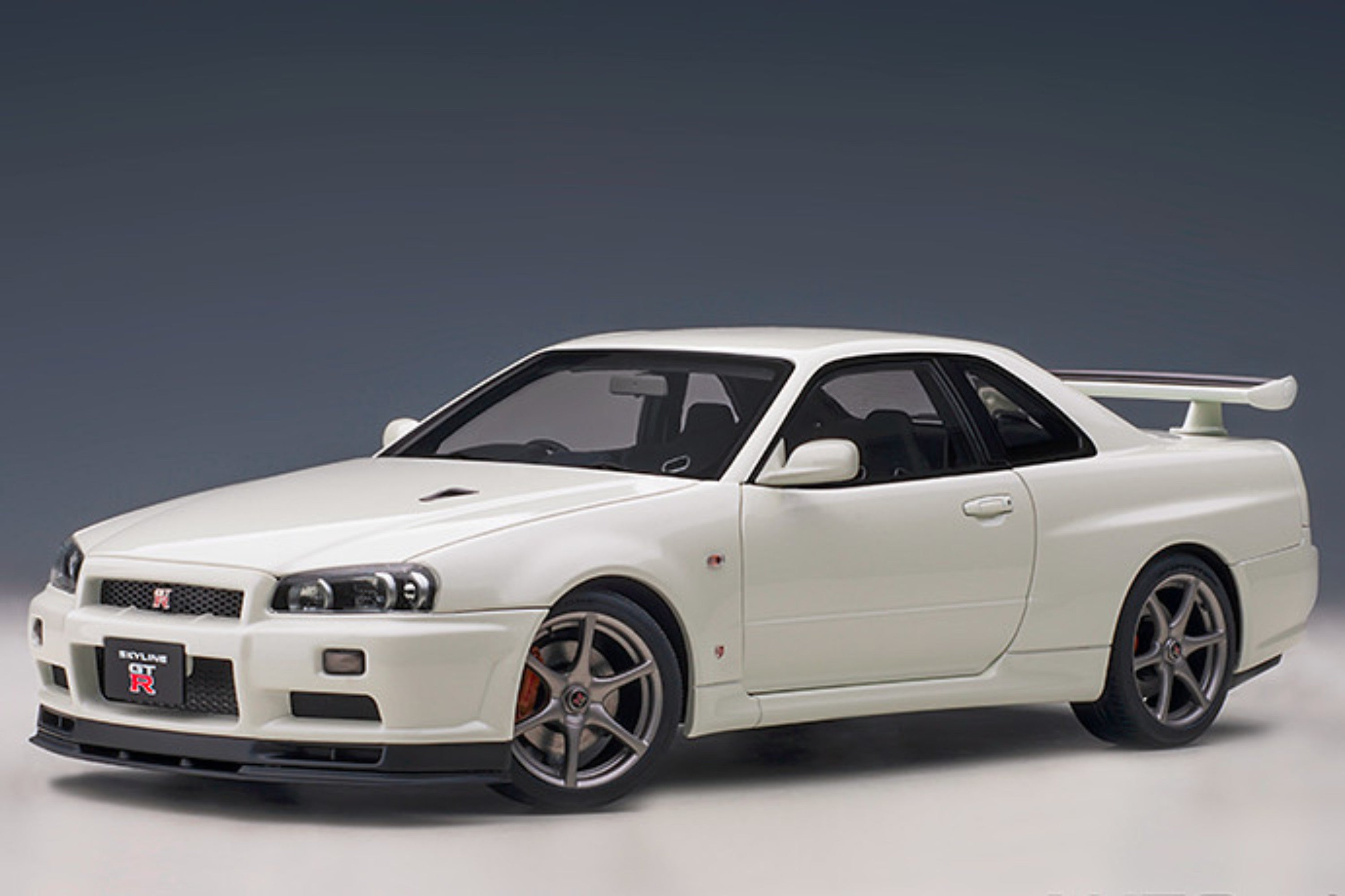 Nissan Skyline GT-R V-Spec II (R34) | 1:18 Scale Model Car by AUTOart | Front Quarter