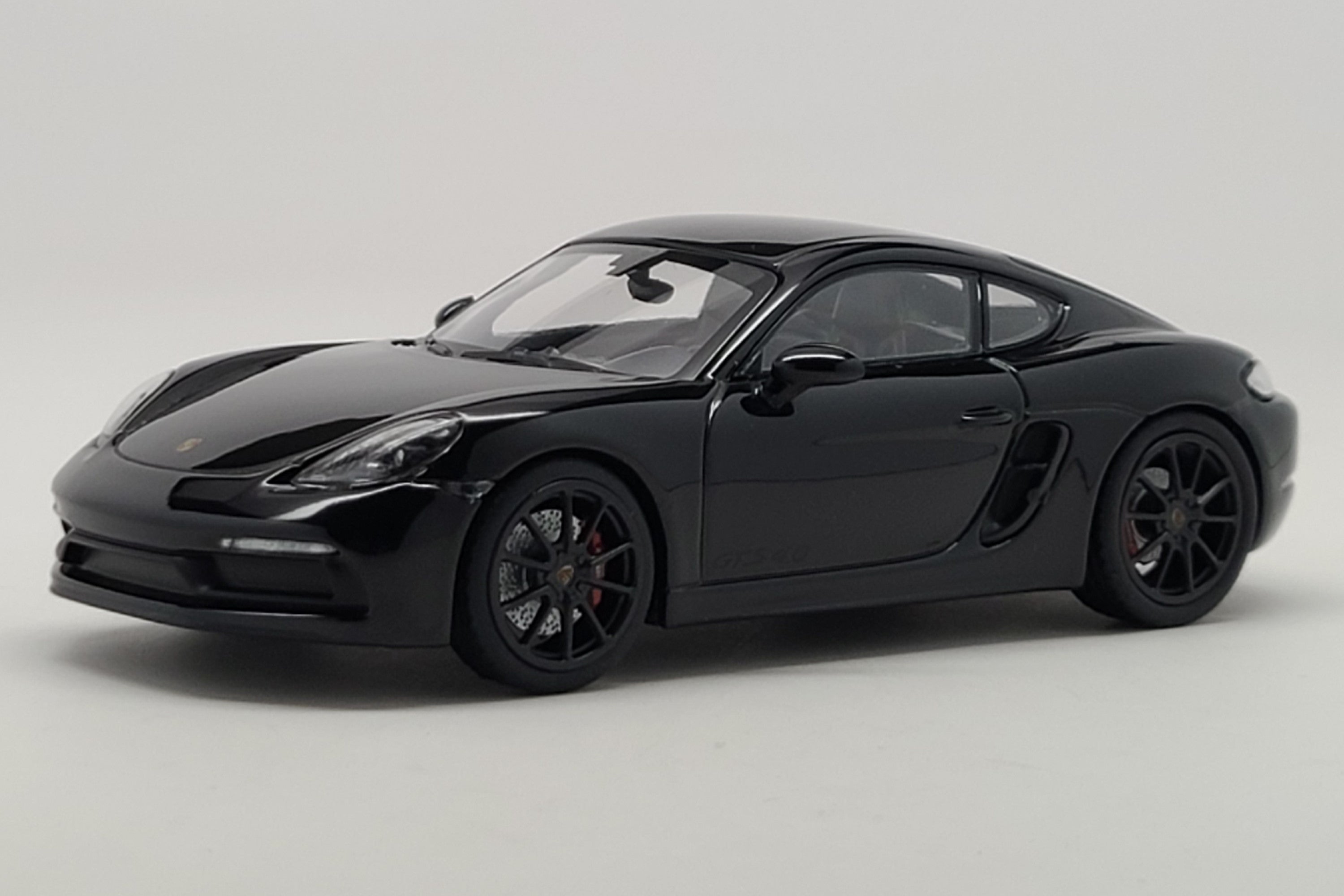 Porsche 718 Cayman GTS 4.0 (982) | 1:43 Scale Diecast Model Car by Minichamps | Black Variant