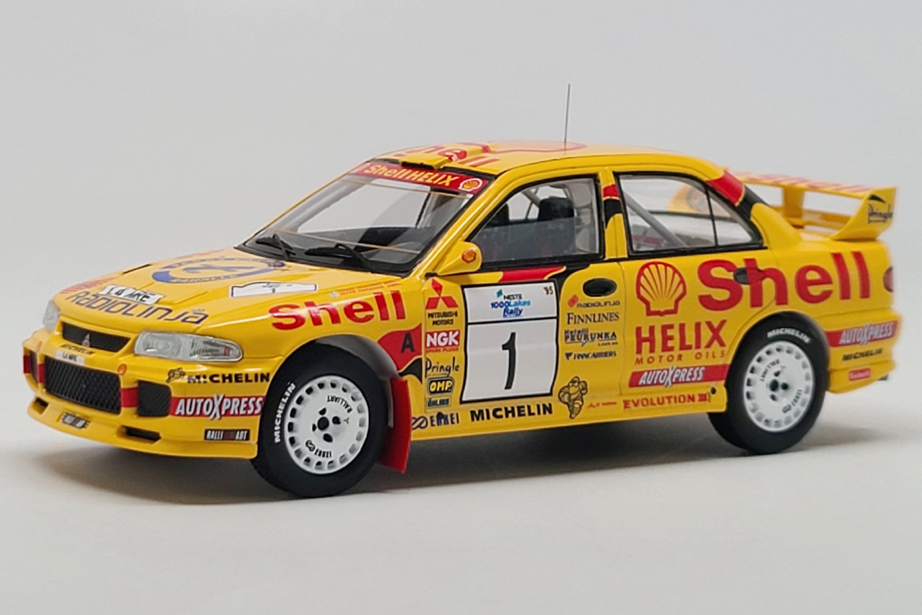 Mitsubishi Lancer Evolution (1995 Rally Finland Winner) - 1:43 Scale Model  Car by Spark